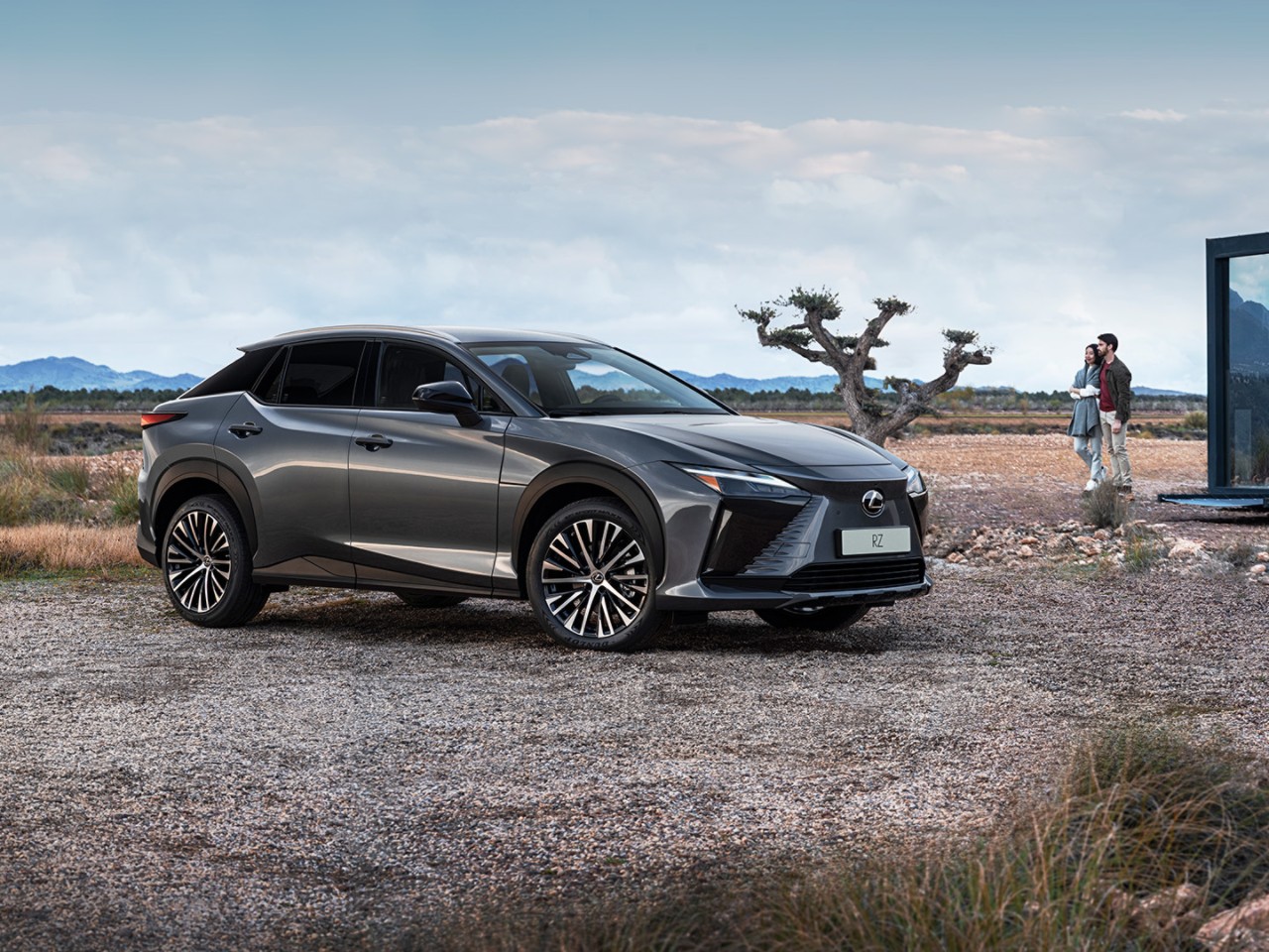 A Lexus RZ 450e parked in a rural location