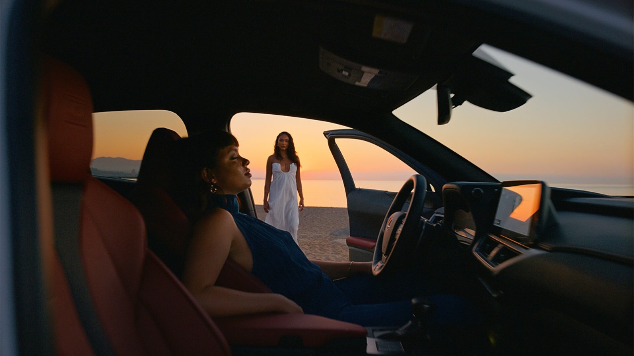 A women sat in a Lexus UX 