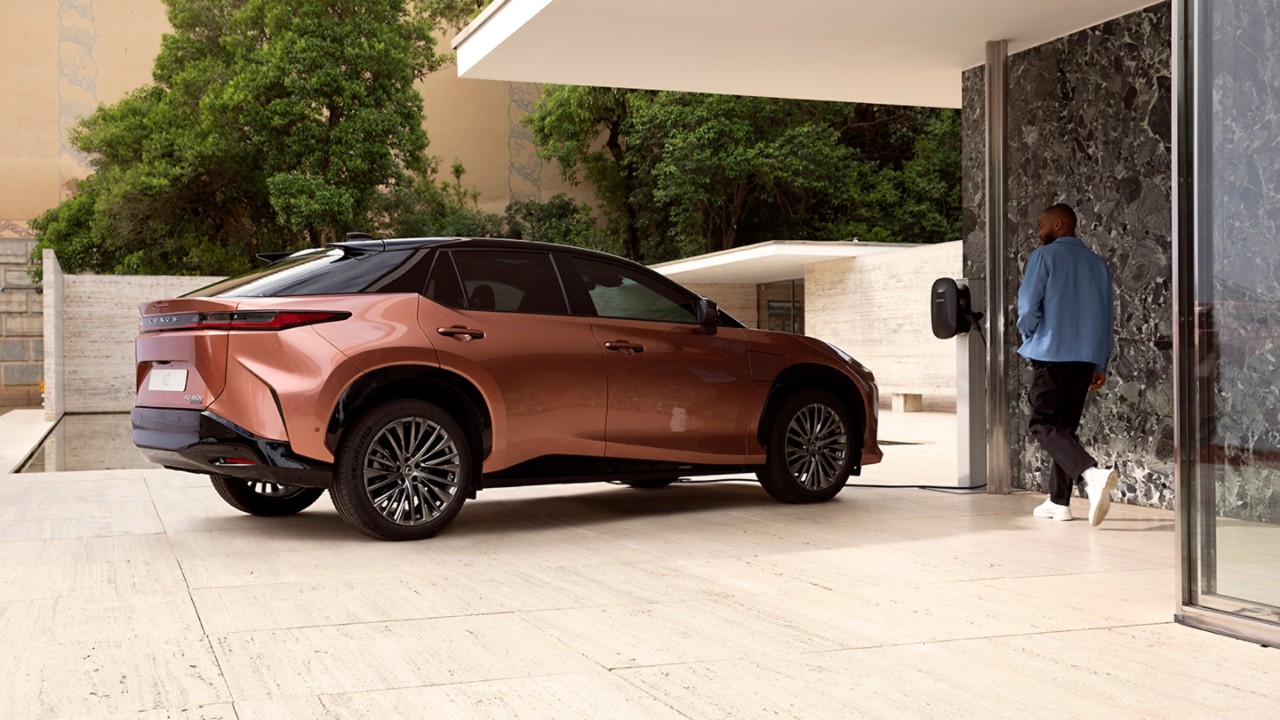 A Lexus RZ 450e parked in a rural location